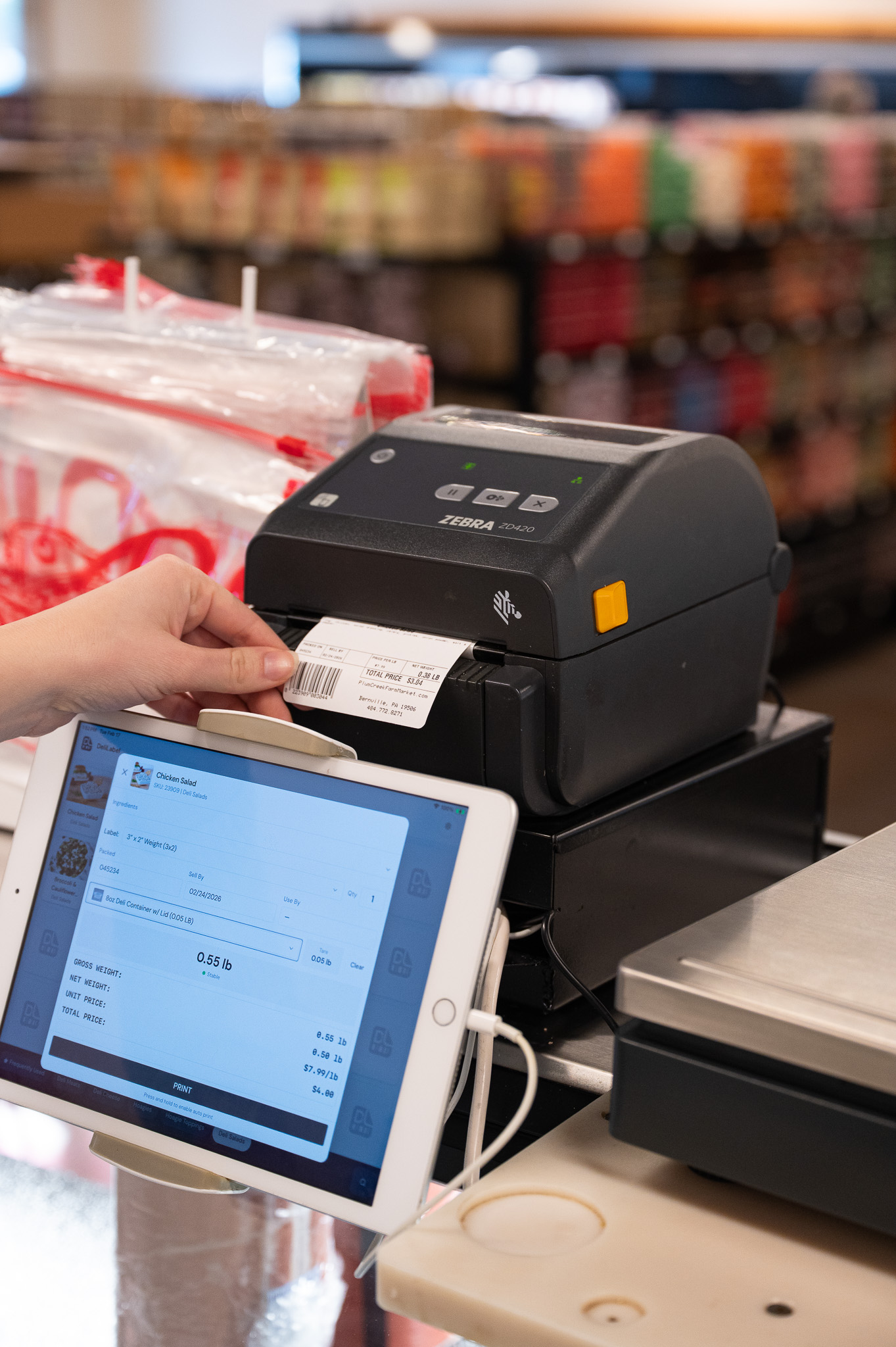 Customers at a deli counter
