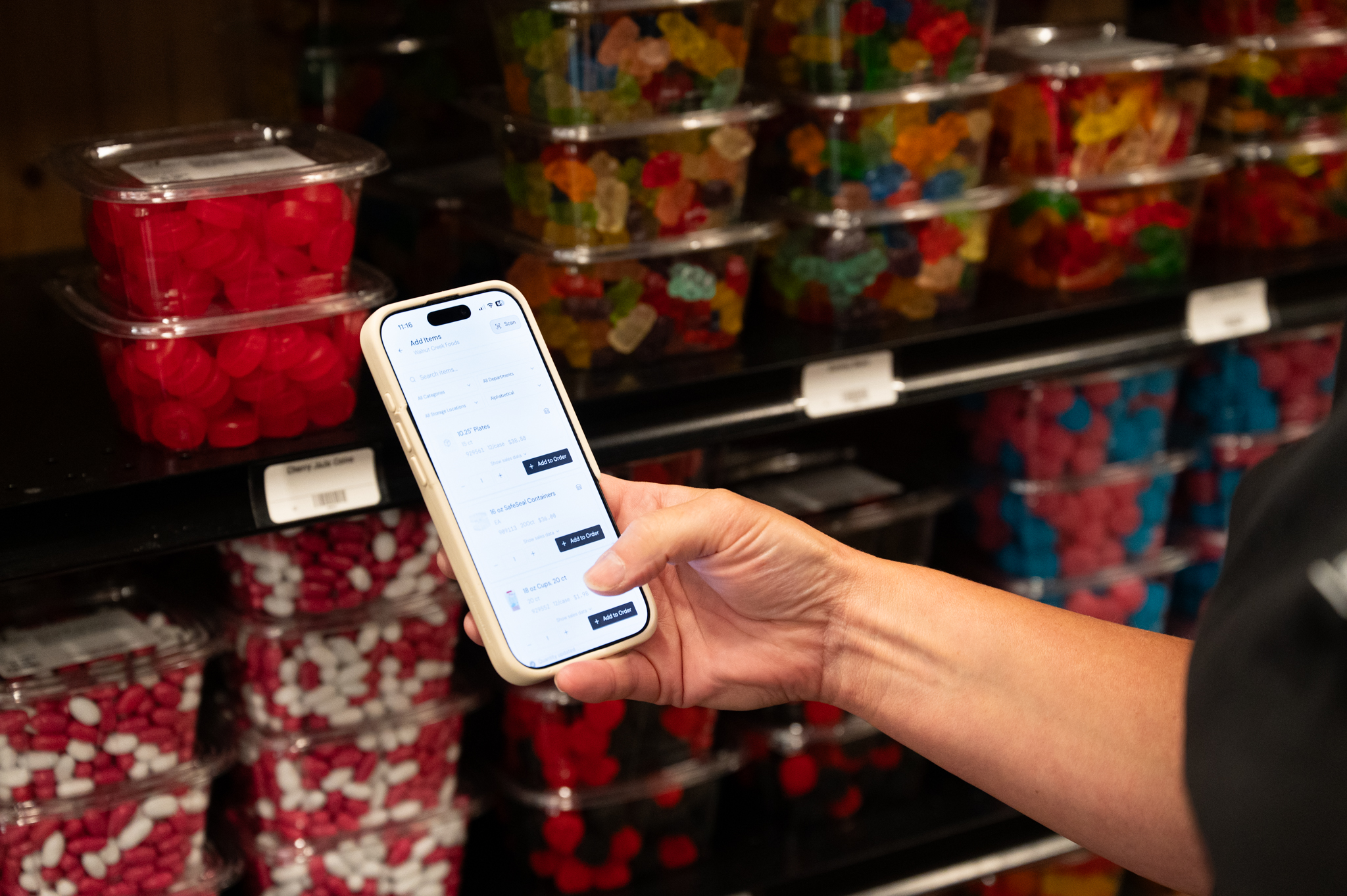Checking an item on the phone in the shop