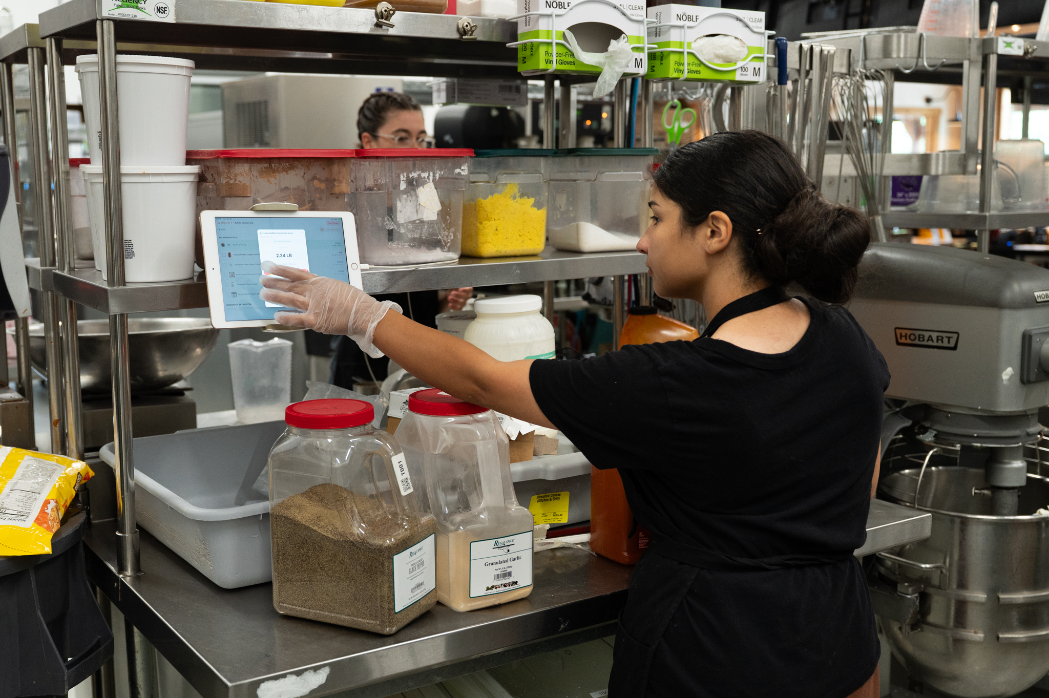 Team member updating inventory on the shelf