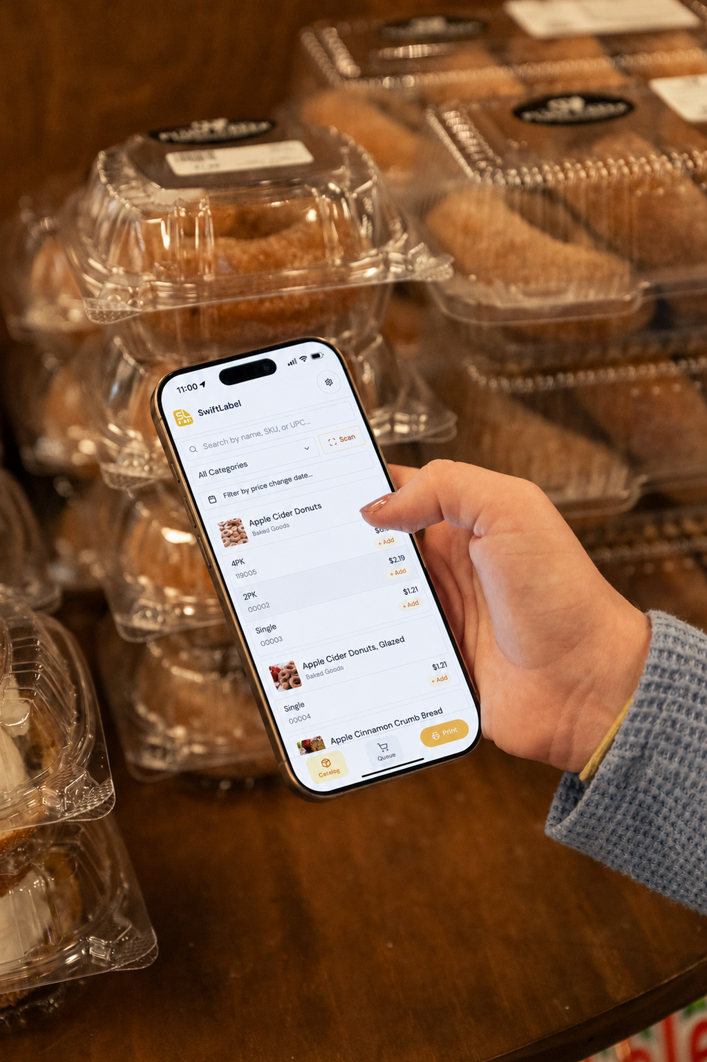 Bakery display case with labeled breads